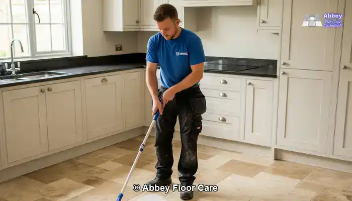 our professional technician applying sealer to a cleaned travertine floor