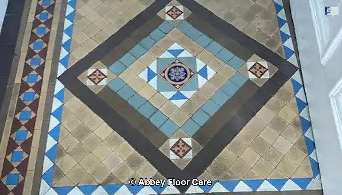 victorian tiled vestibule in edinburgh in a soiled and dull condition