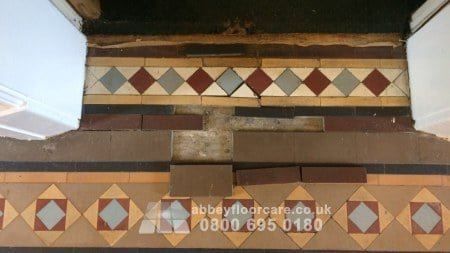loose Victorian Minton tiles lifted during Walsall hallway restoration