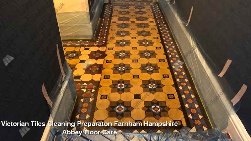 Preparation stage before controlled cleaning of Victorian hallway tiles in Farnham
