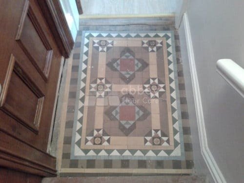 Victorian Minton tile floor in Burton on Trent dulled by ingrained dirt and worn sealer