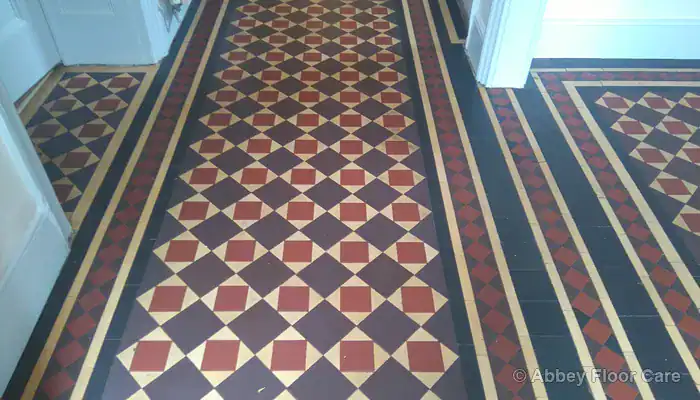 Restored Victorian clay tile floor with natural matt finish and revived colour