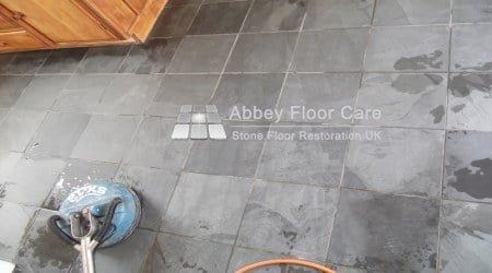 Slate floor tiles after cleaning showing stronger colour and clearer surface