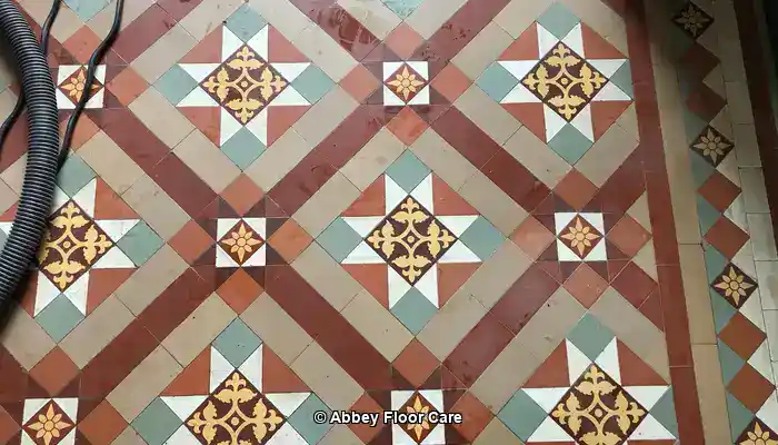 Close-up of Victorian encaustic tiles showing coloured clay pigments and tile structure